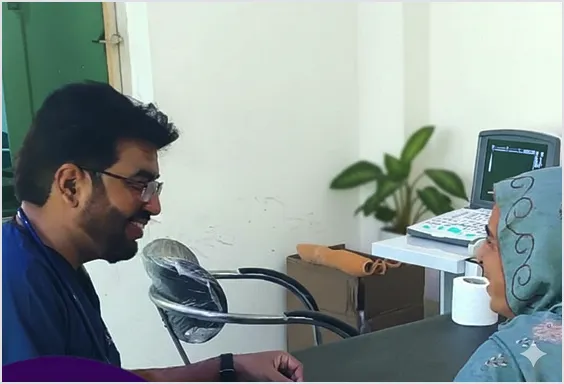 Dr Naeem Guiding Patient in Pakistan